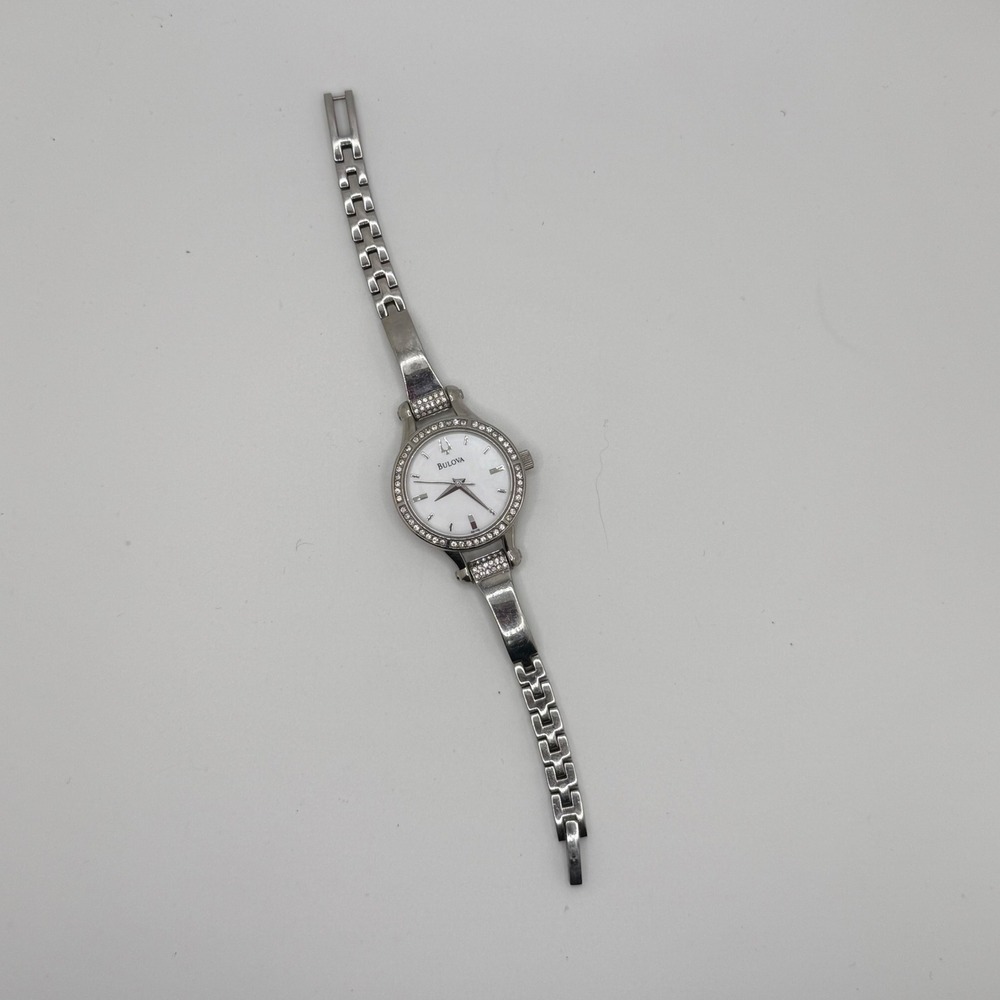 Bulova Women Silver Tone Crystal Bezel White Dial Bangle Watch C869915 READ